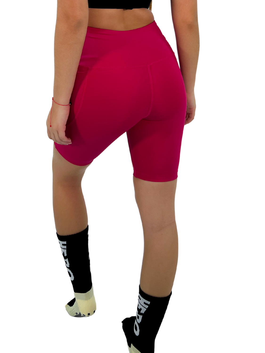 BIKER DEPORTIVO DE DAMA CON BOLSILLOS FUCSIA