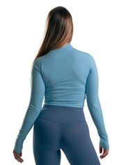 SUETER CROP ZIP AZUL BEBE