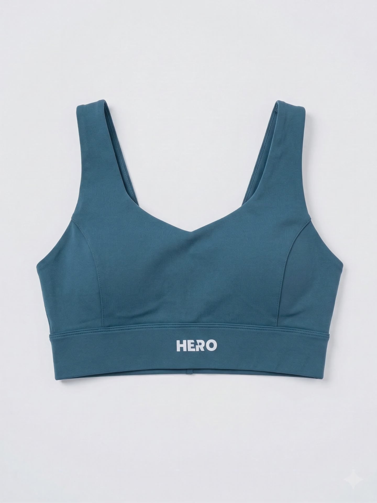 BRASIER DEPORTIVO CRUZADO LISO DESCOTADO EN U HERO TURQUESA