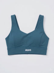BRASIER DEPORTIVO CRUZADO LISO DESCOTADO EN U HERO TURQUESA