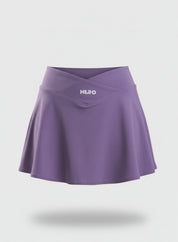 FALDA TENNIS HERO MORADO